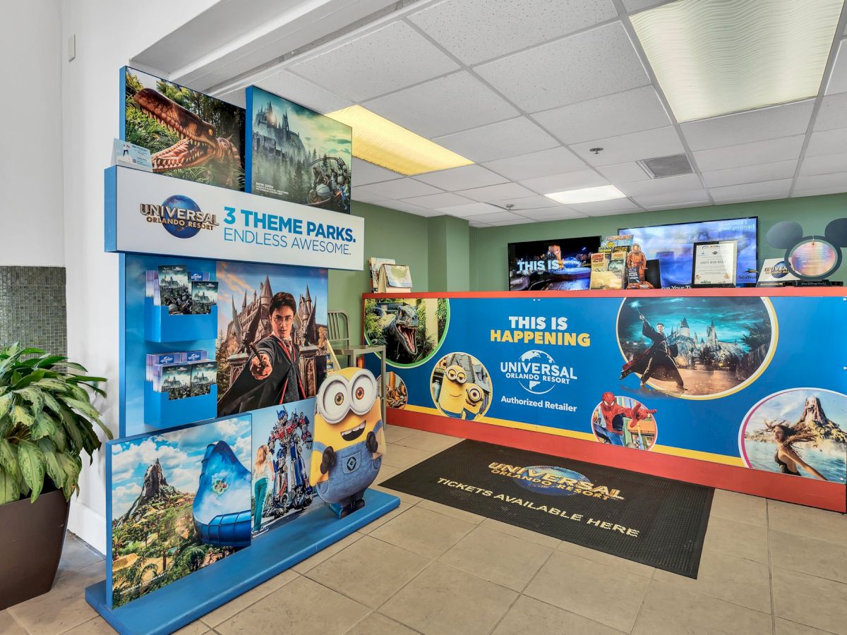 A promotional display for Universal Orlando Resort featuring images of attractions, a minion, and the slogan "3 Theme Parks. Endless Awesome" ends the sentence.